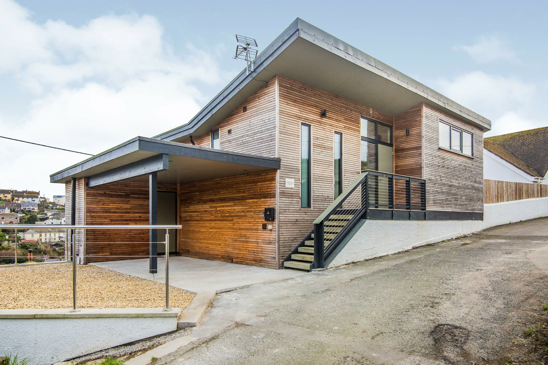 Angwella House, timber clad bespoke building